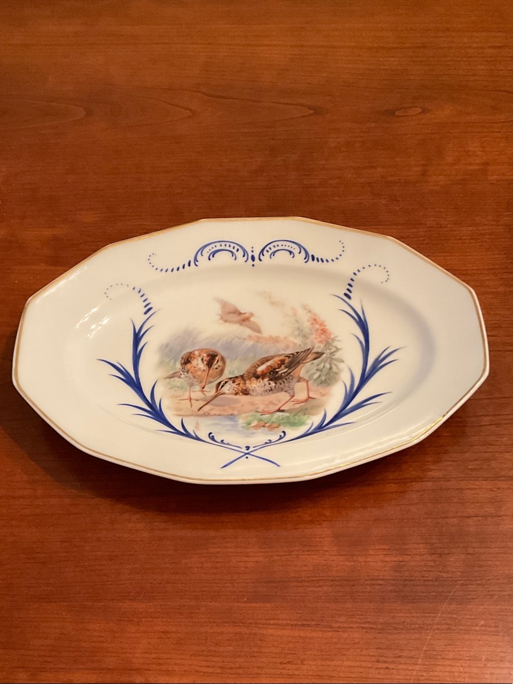 Limoges White Porcelain Serving Bowl with Blue and Gold Accents and Bird Motif